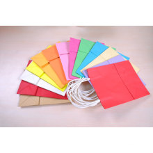 Logotipo de impresión plegable del bolso de papel de compras del color para la promoción actual